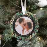 Gilded Greenery Black Married and Merry Two Photo Ornament<br><div class="desc">This gorgeous newlyweds holiday keepsake ornament feature a lush, festive wreath of gold leaves, Christmas greenery, and red holly berries on a modern black background. Your personal wedding photo goes in the centre along with the words "Married and Merry", and there is even a spot for your name. A second...</div>