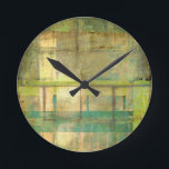 Gilded Turquoise and Green Abstract Painting Round Clock<br><div class="desc">An abstract painting by Jennifer Goldberger that utilises shades of gilded turquoise and green to create a warm,  familiar feeling. A nice stroll through the woods during the spring or summer would yield some of these same colours. Bring the gift of nature to your home by purchasing this piece!</div>