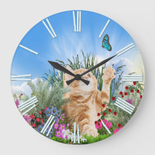 Ginger kitten playing with a butterfly large clock