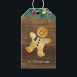 Gingerbread man, holly baby 1st Christmas Gift Tags<br><div class="desc">Baby 1st Christmas gift tag  with Gingerbread man and holly on a wooden background</div>