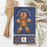 Gingerbread Man Navy Monogram Merry Christmas Tea Towel<br><div class="desc">Celebrate the holiday season with this custom gingerbread man Merry Christmas kitchen towel. Featuring a cute gingerbread man with a red bow tie, a festive "Merry Christmas" greeting, and a personalised monogram on a navy background, this towel adds a fun and festive touch to your kitchen decor. Perfect for gifting...</div>