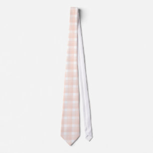 Gingham check pattern. Peach pink and white. Tie