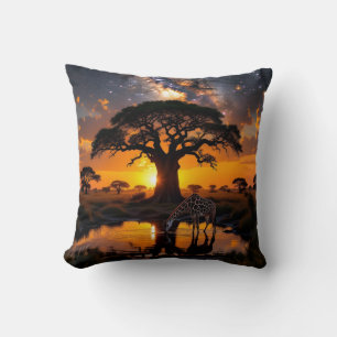 Giraffe drinking water in Cosmic African Sunset Cushion