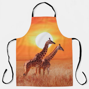 Giraffe in the African savanna against the backdro Apron