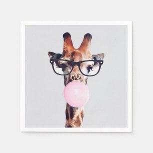 Giraffe wearing glasses blowing a pink bubble gum napkin