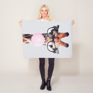 GIRAFFE WEARING GLASSES BLOWING A PINK BUBBLEGUM FLEECE BLANKET