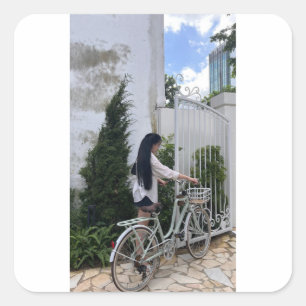girl and bicycle square sticker