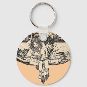 Girl and Boy Reading Key Ring