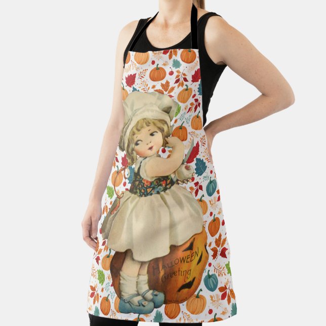 Girl Carving Apple and Colourful Pumpkins Hallowee Apron (Insitu)