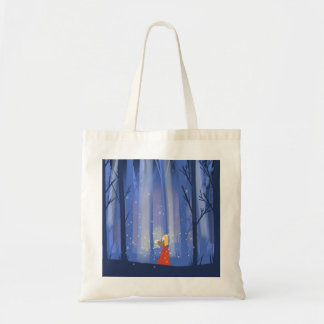 girl catching fireflies in the forest tote bag