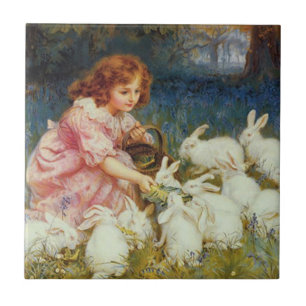 Girl feeding rabbits tile