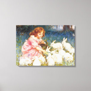 Girl Feeding the Rabbits (by Frederick Morgan) Canvas Print