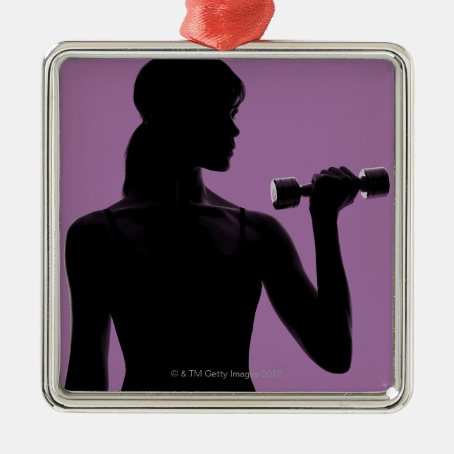 girl lifting dumbbell on purple background metal tree decoration (Front)