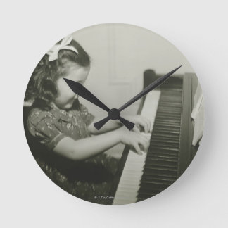 Girl Playing Piano Round Clock