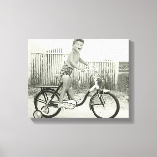 Girl Riding Bicycle Canvas Print