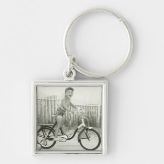 Girl Riding Bicycle Key Ring