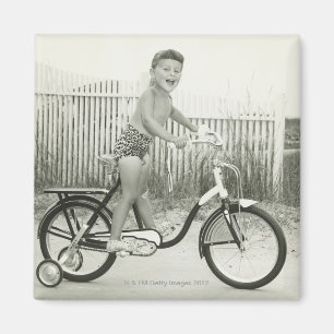 Girl Riding Bicycle Magnet
