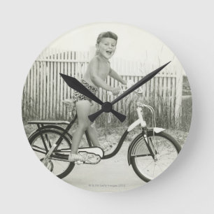 Girl Riding Bicycle Round Clock