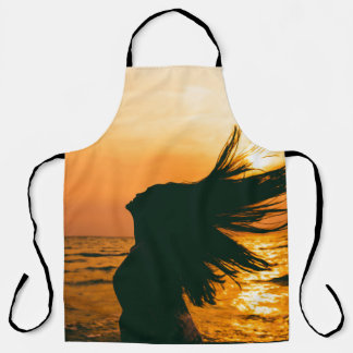 Girl silhouette, sea sunset, freedom. apron