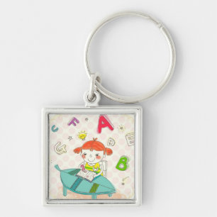 Girl sitting on chair, studying key ring