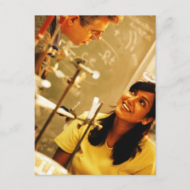 Girl smiling at teacher in chemistry lab postcard (Front)