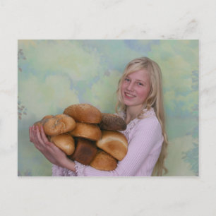 Girl with loafs of bread postcard