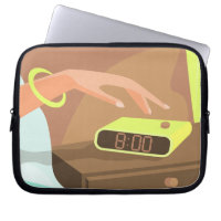 Girls hand pushing on alarm clock snooze button