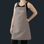 Girly beige greige custom script name monogram apron<br><div class="desc">Personalised beige greige custom modern script name text monogram solid plain colour girly stylish elegant chic beige greige and white text kitchen Apron. Customise,  personalise it with name,  quote,  phrase,  or text.
Great for cooks,  chefs,  pottery,  ceramics,  crafts,  work,  kitchen,  baking,  bbq,  grill,  etc</div>