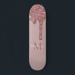 Girly Glam Rose Gold Dripping Glitter Monogram Skateboard<br><div class="desc">Girly Rose Gold Sparkle Glitter Drips Monogram Skateboard with fashion faux blush pink/rose gold glitter drips on a chic background with your custom monogram and name. Great for anyone who loves the luxury glam lifestyle. Perfect for your luxury aesthetic! You're dripping in luxury - show it! Please contact us at...</div>