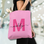 Girly Pink Trendy Modern Script Name Monogram Tote Bag<br><div class="desc">Personalised Girly Pink and Magenta Hot Pink Trendy Modern Script Name Monogram Tote Bag. Add a burst of fun and femininity to your everyday style with this chic and playful tote bag. Featuring a bright, happy pink background and a bold magenta hot pink initial (with no shimmer or foil), paired...</div>