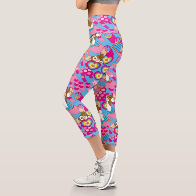 Gizmo | Pink Peace & Love Pattern Capri Leggings (Left)