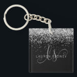 Glam Black Silver Glitter Monogram Name Key Ring<br><div class="desc">Glam Black Silver Glitter Elegant Monogram Keychain Easily personalise this trendy chic keychain design featuring elegant silver sparkling glitter on a black background. The design features your handwritten script monogram with pretty swirls and name.</div>