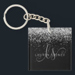Glam Black Silver Glitter Monogram Name Key Ring<br><div class="desc">Glam Black Silver Glitter Elegant Monogram Keychain Easily personalise this trendy chic keychain design featuring elegant silver sparkling glitter on a black background. The design features your handwritten script monogram with pretty swirls and name.</div>