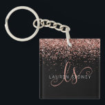 Glam Rose Gold Glitter Elegant Monogram Key Ring<br><div class="desc">Glam Rose Gold Glitter Elegant Monogram Keychain Easily personalise this trendy chic keychain design featuring elegant rose gold sparkling glitter on a black background. The design features your handwritten script monogram with pretty swirls and name.</div>