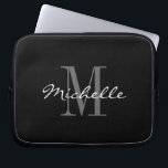 Glamourous black and white monogram laptop sleeves<br><div class="desc">Glamourous black and white monogram laptop sleeves. Elegant script typography design with monogrammed initial letter. Classy template for men women and kids. Custom computer accessories with luxurious logo. Cute Birthday gift idea for mum, dad, son, daughter, co worker, employee, boss etc. Pretty covers available in different sizes; 10 13 and...</div>