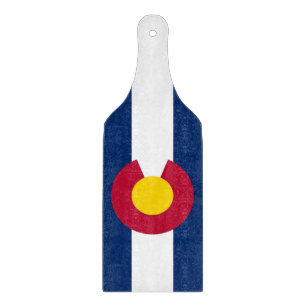 Glass cutting board paddle with flag of Colorado