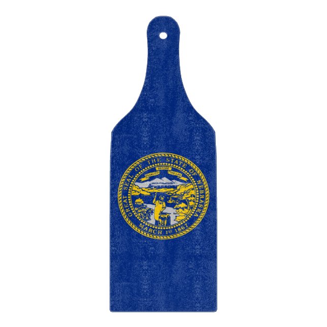 Glass cutting board paddle with Nebraska flag (Front)