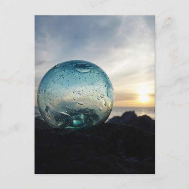 Glass float and sunset postcard (Front)