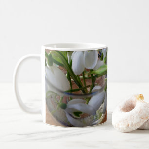 glass of snowdrops coffee mug