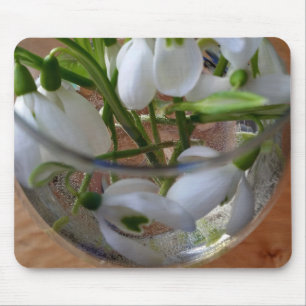glass of snowdrops mouse mat