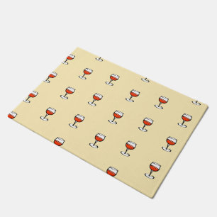 Glass of wine on orange doormat
