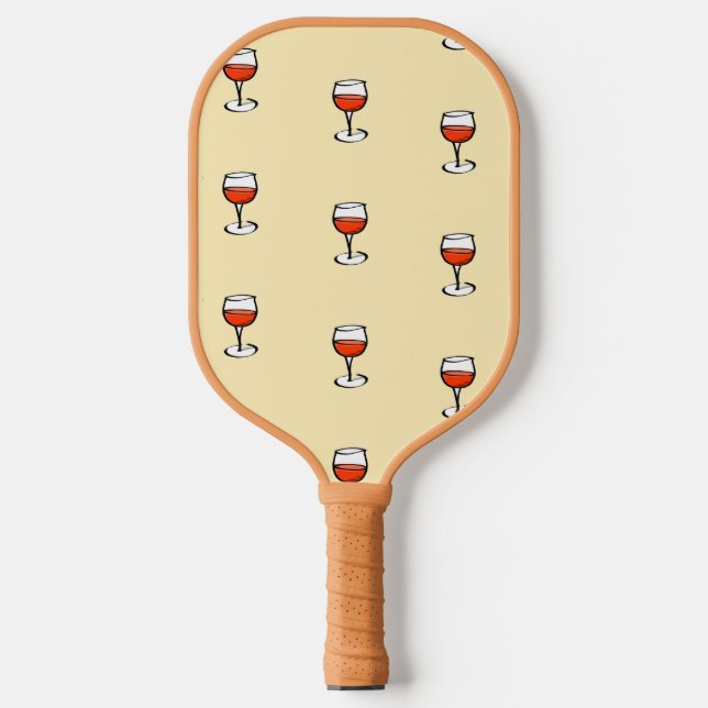Glass of wine on orange pickleball paddle (Front)