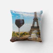 Glass of wine with brie cheese on Eiffel tower