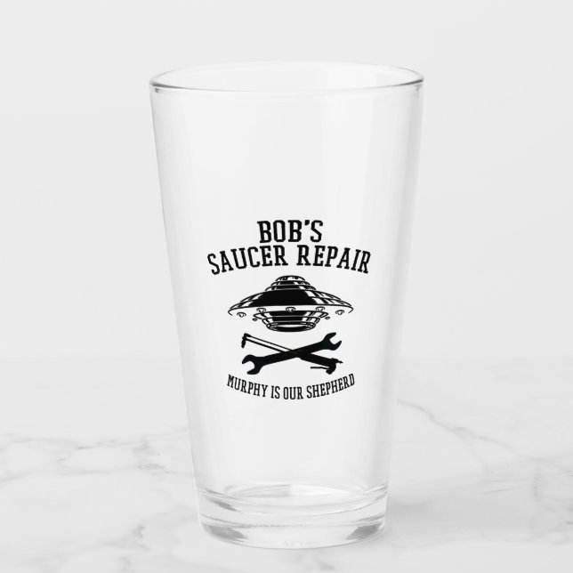 glass tumbler with black Bob's Saucer Repair logo (Front)