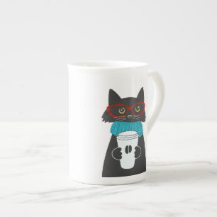 Glasses cat holding a cup of coffee