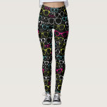 Glasses Spectacles Patterned Leggings Black<br><div class="desc">These printed leggings have a black background and an all over print of glasses frames or spectacles in lime green,  electric blue,  magenta and white. Love eyeglasses? Check out the Spectacular Spectacles collection from Asterisk Designs for coordinating products.</div>