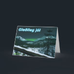 Gleðileg Jól - Silent Night Holiday Card<br><div class="desc">Night has fallen in the far north and there is a hint of the Northern Lights beyond the mountains on the horizon. Moonlight reflects off the snow-covered landscape. Icelandic text reading "Gleðileg jól" (Merry Christmas) appears in glowing blue and white.</div>