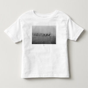 Glider being prepared for flight by toddler T-Shirt