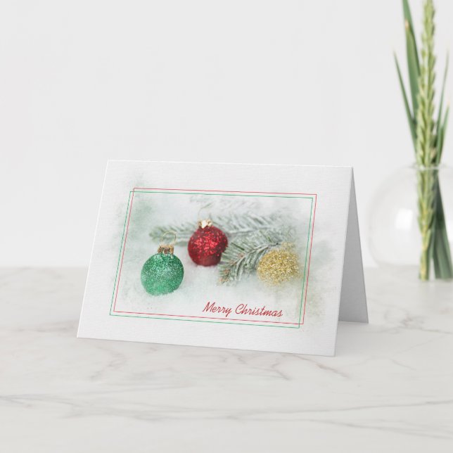 glitter Christmas ornaments and pine in snow Holiday Card (Front)