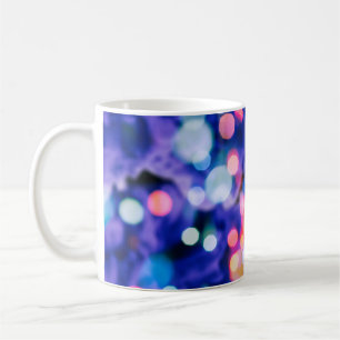 glittering shine bulbs lights background:blur of C Coffee Mug